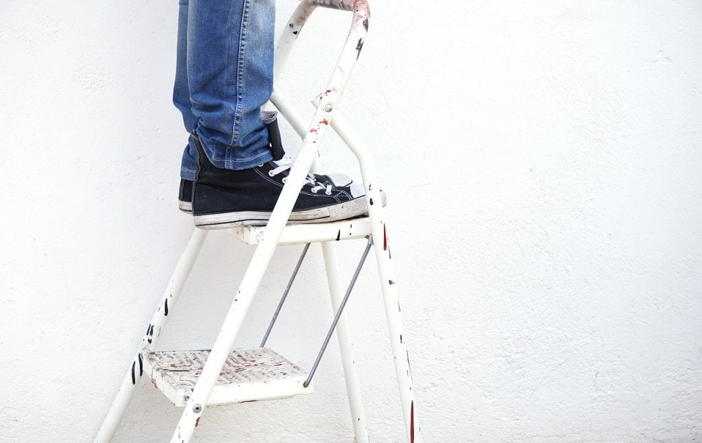 Use A Ladder To Reach Higher Parts of the Window When Cleaning