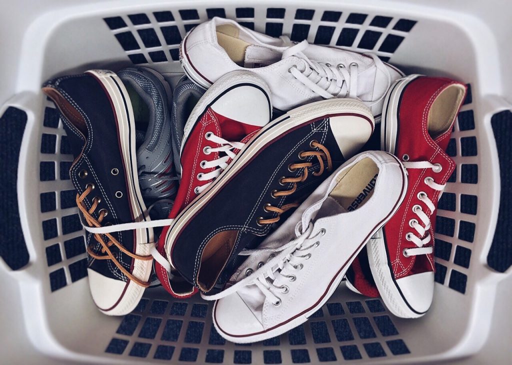 Never throw your footwear into the washing machine!